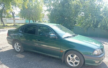 Toyota Avensis III рестайлинг, 1998 год, 420 000 рублей, 23 фотография