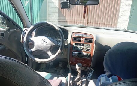 Toyota Avensis III рестайлинг, 1998 год, 420 000 рублей, 24 фотография