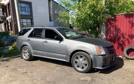 Cadillac SRX II рестайлинг, 2008 год, 300 000 рублей, 12 фотография