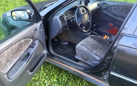 Toyota Avensis III рестайлинг, 1998 год, 135 000 рублей, 6 фотография