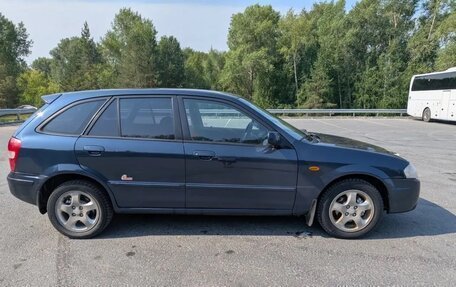 Mazda 323, 1999 год, 250 000 рублей, 4 фотография