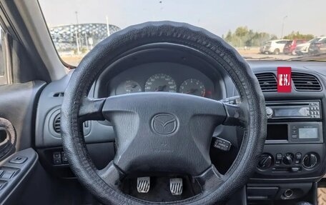 Mazda 323, 1999 год, 250 000 рублей, 7 фотография