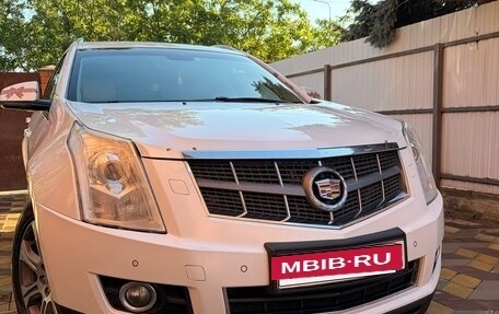 Cadillac SRX II рестайлинг, 2012 год, 1 100 000 рублей, 2 фотография