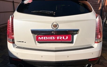 Cadillac SRX II рестайлинг, 2012 год, 1 100 000 рублей, 11 фотография