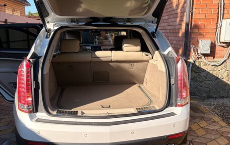 Cadillac SRX II рестайлинг, 2012 год, 1 100 000 рублей, 21 фотография