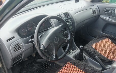 Mazda 323, 1998 год, 130 000 рублей, 4 фотография