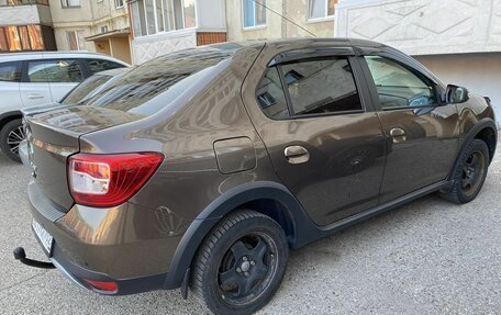Renault Logan II, 2022 год, 990 000 рублей, 2 фотография