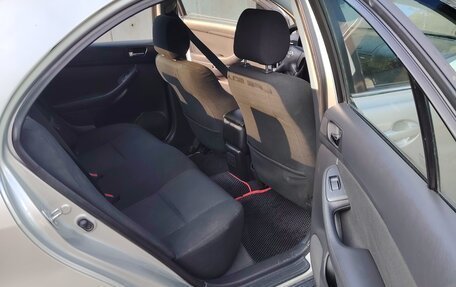 Toyota Avensis III рестайлинг, 2006 год, 600 000 рублей, 12 фотография