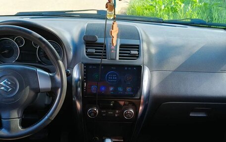 Suzuki SX4 II рестайлинг, 2010 год, 650 000 рублей, 23 фотография