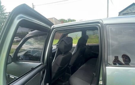 Chevrolet Niva I рестайлинг, 2011 год, 600 000 рублей, 11 фотография