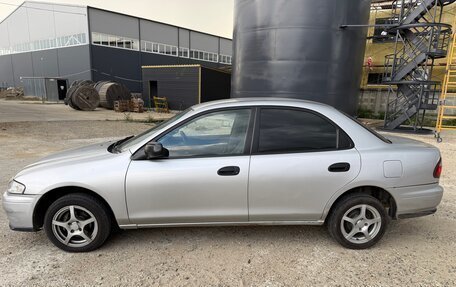 Mazda Familia, 1997 год, 245 000 рублей, 3 фотография