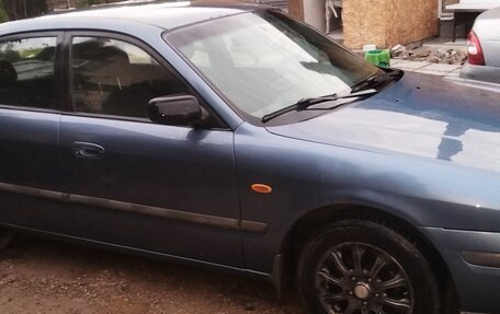 Mazda 626, 1999 год, 210 000 рублей, 4 фотография