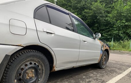 Mitsubishi Mirage VI рестайлинг, 2000 год, 100 000 рублей, 4 фотография