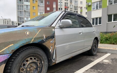 Mitsubishi Mirage VI рестайлинг, 2000 год, 100 000 рублей, 3 фотография