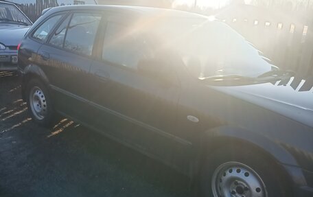 Mazda 323, 1999 год, 270 000 рублей, 2 фотография