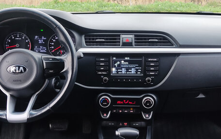 KIA Rio IV, 2018 год, 21 фотография