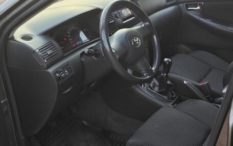 Toyota Corolla, 2004 год, 750 000 рублей, 10 фотография