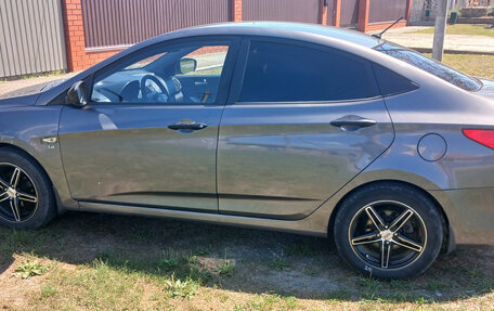 Hyundai Solaris II рестайлинг, 2011 год, 620 000 рублей, 13 фотография