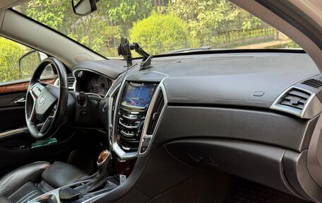 Cadillac SRX II рестайлинг, 2013 год, 1 250 000 рублей, 23 фотография