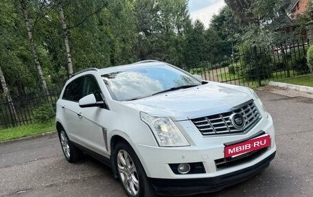 Cadillac SRX II рестайлинг, 2013 год, 1 250 000 рублей, 33 фотография