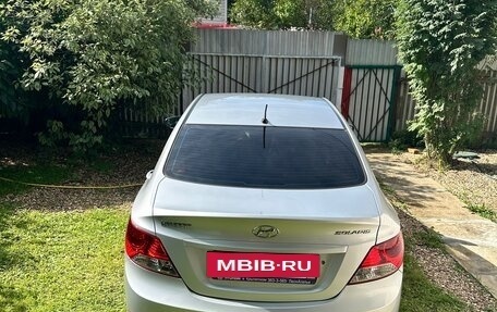 Hyundai Solaris II рестайлинг, 2011 год, 670 000 рублей, 2 фотография