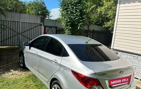 Hyundai Solaris II рестайлинг, 2011 год, 670 000 рублей, 13 фотография