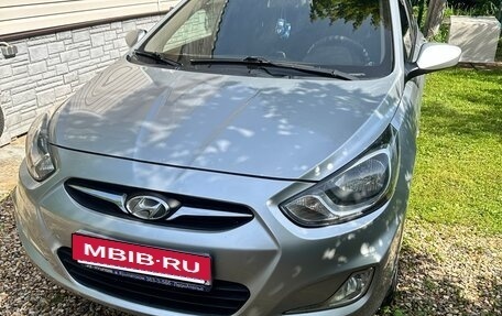 Hyundai Solaris II рестайлинг, 2011 год, 670 000 рублей, 18 фотография