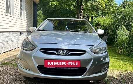 Hyundai Solaris II рестайлинг, 2011 год, 670 000 рублей, 19 фотография