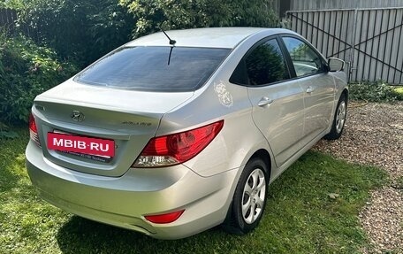 Hyundai Solaris II рестайлинг, 2011 год, 670 000 рублей, 23 фотография