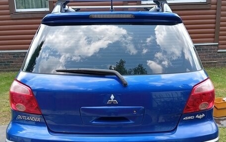 Mitsubishi Outlander III рестайлинг 3, 2007 год, 600 000 рублей, 3 фотография