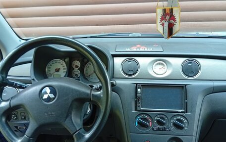 Mitsubishi Outlander III рестайлинг 3, 2007 год, 600 000 рублей, 9 фотография