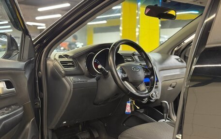 KIA Rio III рестайлинг, 2012 год, 750 000 рублей, 19 фотография