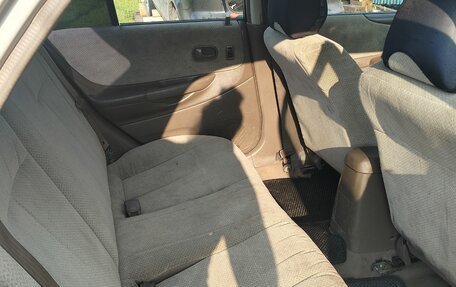 Mazda 323, 1999 год, 160 000 рублей, 10 фотография