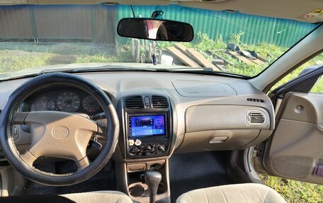 Mazda 323, 1999 год, 160 000 рублей, 6 фотография