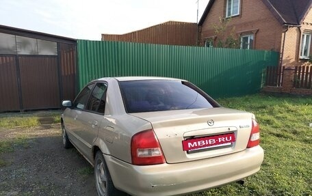Mazda 323, 1999 год, 160 000 рублей, 5 фотография