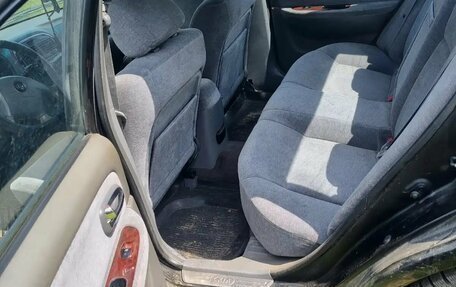 KIA Magentis I, 2005 год, 150 000 рублей, 11 фотография