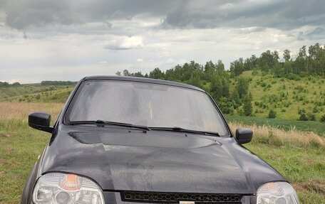 Chevrolet Niva I рестайлинг, 2012 год, 550 000 рублей, 1 фотография