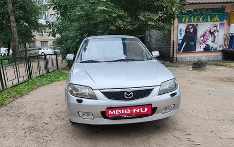 Mazda 323, 2003 год, 135 000 рублей, 3 фотография