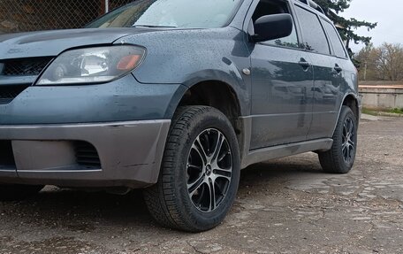 Mitsubishi Outlander III рестайлинг 3, 2003 год, 600 000 рублей, 2 фотография