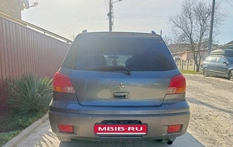 Mitsubishi Outlander III рестайлинг 3, 2003 год, 600 000 рублей, 8 фотография