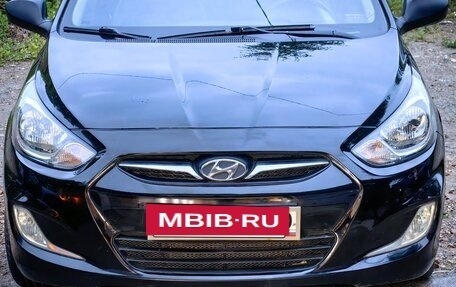 Hyundai Solaris II рестайлинг, 2011 год, 599 000 рублей, 10 фотография