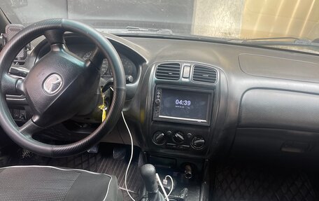 Mazda 323, 2001 год, 220 000 рублей, 5 фотография