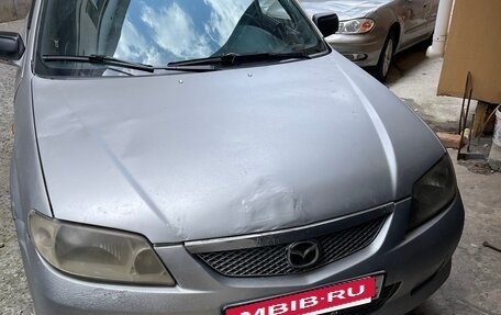 Mazda 323, 2001 год, 220 000 рублей, 7 фотография
