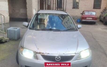 Mazda Familia, 2002 год, 135 000 рублей, 2 фотография
