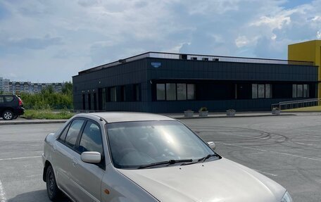 Ford Laser IV, 2000 год, 250 000 рублей, 3 фотография