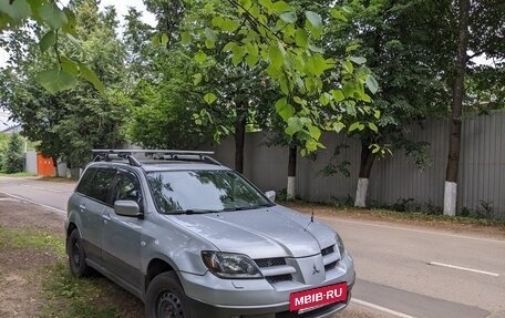 Mitsubishi Outlander III рестайлинг 3, 2004 год, 950 000 рублей, 13 фотография