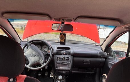 Opel Tigra, 1995 год, 200 000 рублей, 17 фотография