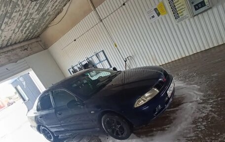 Mitsubishi Carisma I, 2001 год, 175 000 рублей, 10 фотография