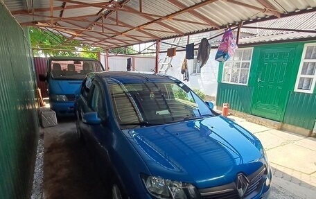 Renault Logan II, 2014 год, 900 000 рублей, 4 фотография