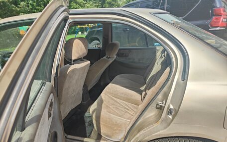 Nissan Primera II рестайлинг, 1992 год, 260 000 рублей, 17 фотография